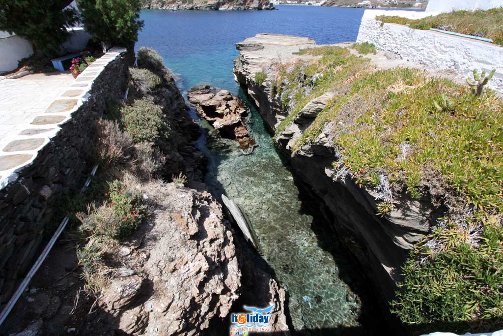 It is an island - Chrysopigi church is built on a small islet and is connected to Sifnos with a small bridge by Ioannis Matrozos